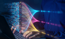 Hero-image_DataEng--crop-small Man reviewing data on laptop